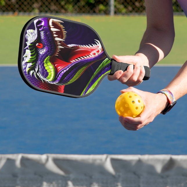 Cobra snake with vibrant green and purple scales pickleball paddle (Insitu)