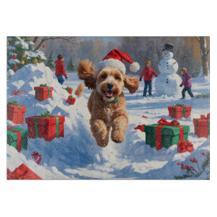 Cockapoo Running in Snow with Christmas Hat Cutting Board