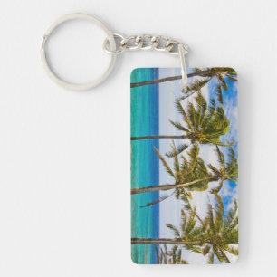 Coconut palm trees (Cocos nucifera) swaying in Keychain