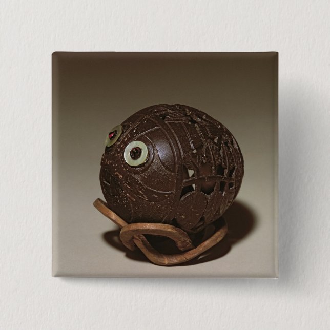 Coconut sculpted into a face, c.1895 2 inch square button (Front)