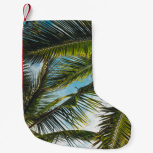 Coconut tree leaves under blue sky in the morning small christmas stocking