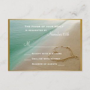 Coeur découpé dans le sable épousant la carte de