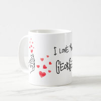 Coeurs de doigt d'amour rouge tasse de café