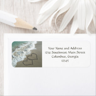 Coeurs de sable sur la plage