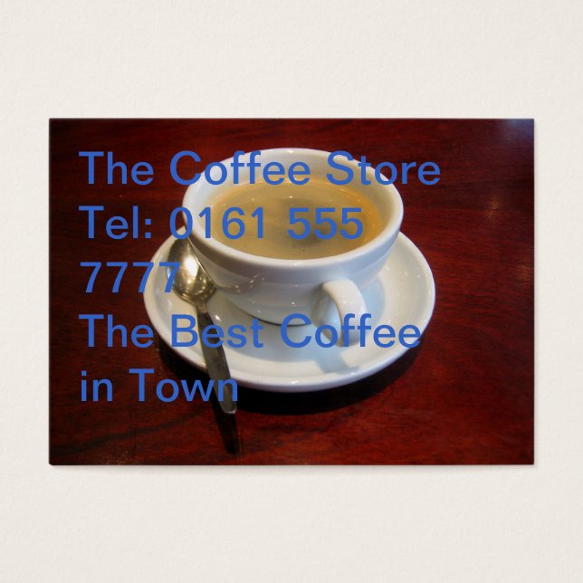 Coffee cup on wooden table (Front)