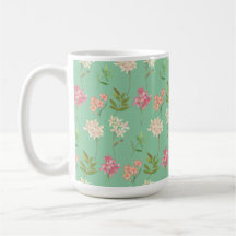 coffee mug with floral design on green background