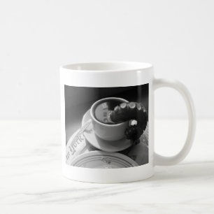 Coffee mug with tentacle