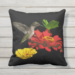 Colibri sur le coussin extérieur animal de fleur