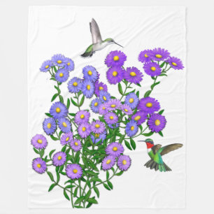 Colibris sur la couverture pourpre d'ouatine de
