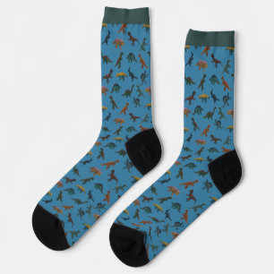 Collage of Plastic Toy Dinosaurs on Blue Socks