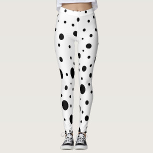 Collants amusants noirs à pois sur fond blanc