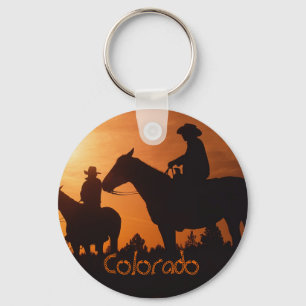 Colorado cowboys on horses keychain