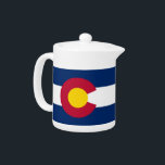 Colorado State Flag Teapot<br><div class="desc">Elevate your tea time with a touch of state pride using our teapot featuring the flag of Colorado! This charming teapot combines elegant design with the iconic elements of the Colorado flag, showcasing its vibrant colours and distinctive pattern. The flag adds a unique and stylish touch, making it perfect for...</div>