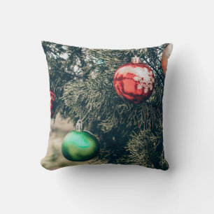 Colorful Christmas bauble decoration on a tree. Vi Throw Pillow