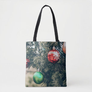 Colorful Christmas bauble decoration on a tree. Vi Tote Bag