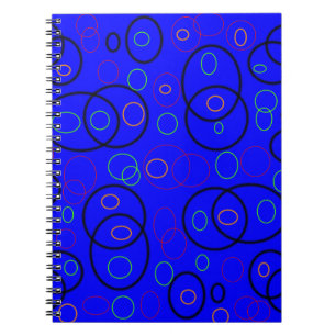 Colorful circles on blue notebook