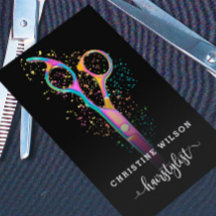 colorful hairdresser scissors on black