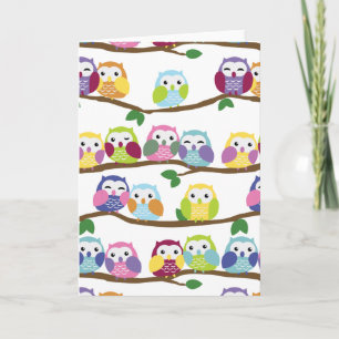 Colorful owls on a branch card