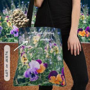 Colorful pansies in a summer country garden tote bag