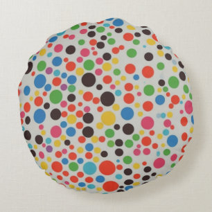 Colorful polka dots: A cushion of cuteness and com