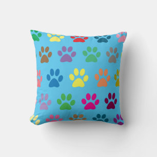 Colorful puppy paw prints throw pillow
