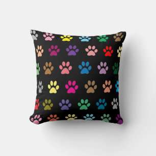 Colorful puppy paw prints throw pillow
