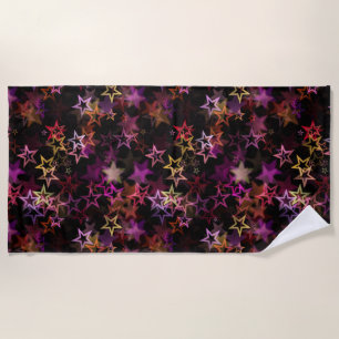 Colorful Stars Dance Whimsically  Beach Towel