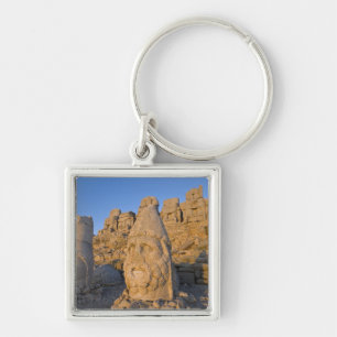Colossal head statues of Gods guarding the Keychain