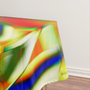 Colour stains on curved greenish beige strips tablecloth