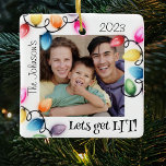 Coloured Christmas Lights Photo Christmas Ceramic Ornament<br><div class="desc">Send your holiday cheer this season with a personalized 'Lets Get Lit' Christmas ornament! Featuring a bright and bold display of lights surrounding your family photo, your name and year, this ornament is sure to make a lasting impression. Put the perfect finishing touch on your holiday with this unique and...</div>