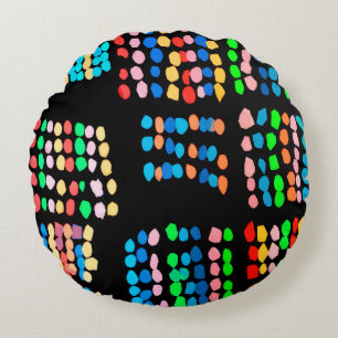 Coloured dots round pillow