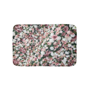 Colourful artificial flowers: vibrant background bath mat