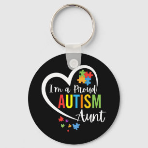 Colourful autism awareness puzzle pieces heart per keychain