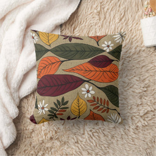 Colourful autumn leaves on a warm background throw pillow
