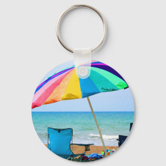 Colourful beach umbrella and chairs in Florida Keychain