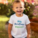 Colourful Big Brother Monogram Name White T-Shirt<br><div class="desc">He is ready for his new title with this white tee featuring "Big Brother" in bold, colourful typography and a customizable name in a fun contrasting colour. The bright multicolor design adds personality to pregnancy announcements, baby shower celebrations, and first photos with the new baby. A personalized monogram keepsake that...</div>