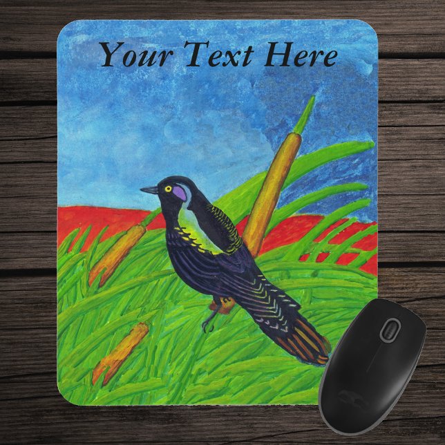 Colourful Black Bird Mousepad (Colourful bird sitting in tall grass with yellow reed plants blue sky on mousepad.)