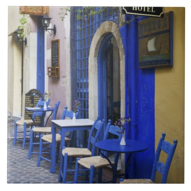 Colourful Blue doorway and siding to old hotel in Tile (Front)