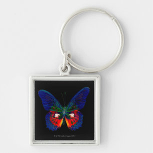 Colourful Butterfly design against black backdrop Keychain