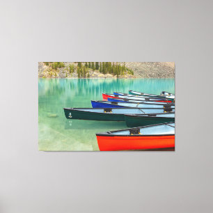 Colourful Canoes on Turquoise Moraine Lake Canvas Print