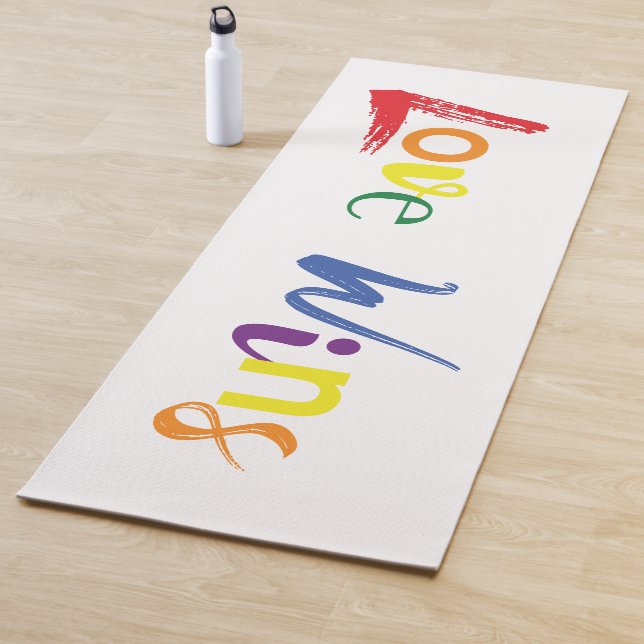 Colourful, cheerful, creative design of Love Wins Yoga Mat (In Situ)
