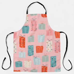 Colourful Christmas gifts on a pink background. Se Apron