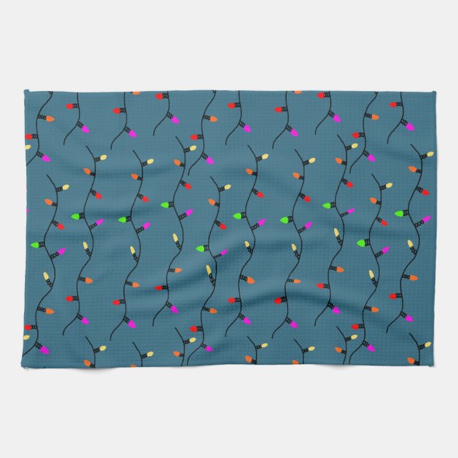 Colourful Christmas Lights On Blue Kitchen Towel (Horizontal)