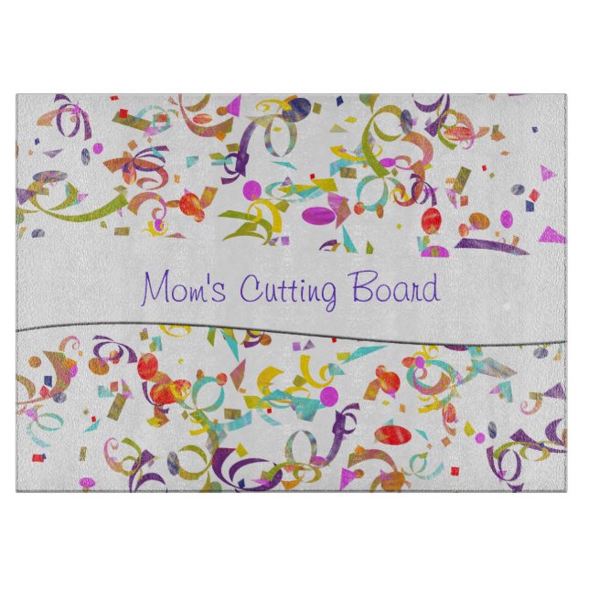 Colourful Confetti Toss Over White Cutting Board (Front)