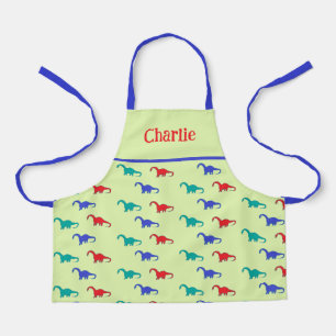 Colourful dinosaurs pattern on green apron