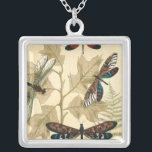 Colourful Dragonflies Floating Above Leaves Silver Plated Necklace<br><div class="desc">Huge dragonflies float above leaves in this piece by Megan Meagher. An alluring depiction of nature. Make sure to place it on your favourite wall!</div>