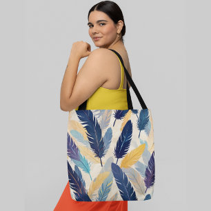 Colourful feathers in shades of blue yellow patter tote bag