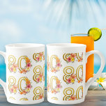 Colourful Floral 80th Birthday Gold Number 80 Part Bone China Mug<br><div class="desc">80th birthday gift mug with colourful pattern of gold number 80 decorated with pretty flowers. Feminine and elegant design with watercolor floral arrangements in shades of pink yellow orange and purple. Perfect for 80th birthday celebration,  spring or summer birthday lunch,  garden tea party etc.</div>