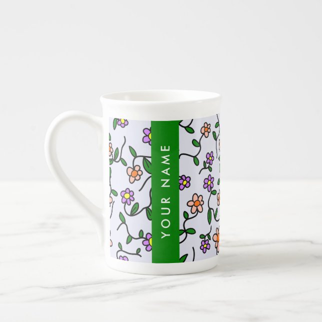 Colourful Flowers, Blue Background, Green Bone China Mug (Left)