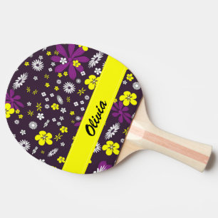 Colourful flowers on black ping pong paddle